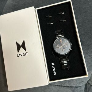 Movement black womens watch. Never worn!